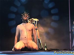 crazy fetish injection needle demonstrate on stage